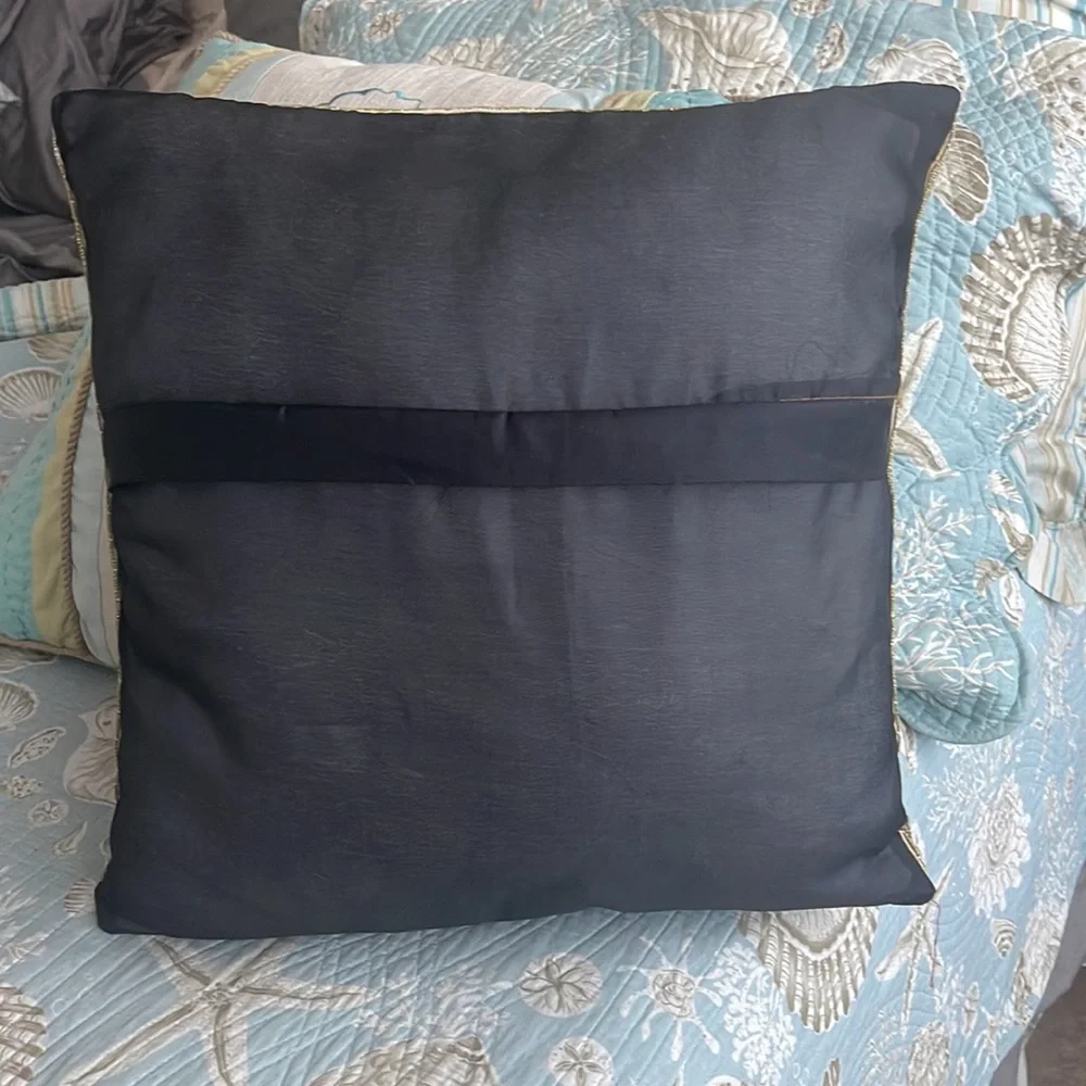 Elephant lovers this pillow is lovely exotic and quite intricate black silk back